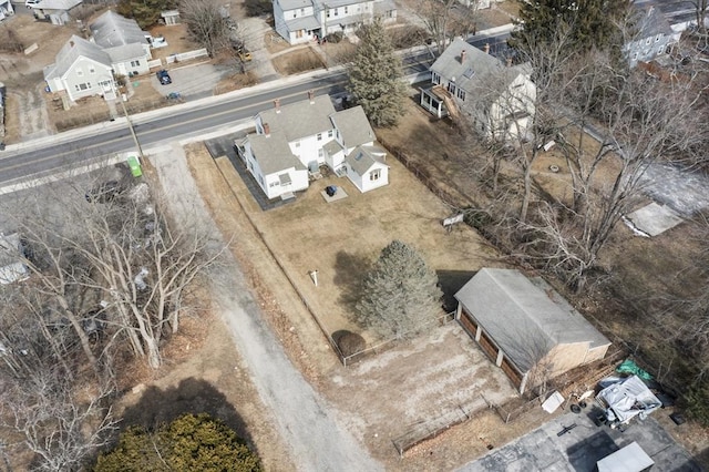 birds eye view of property with a residential view