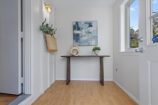 doorway with light hardwood / wood-style floors