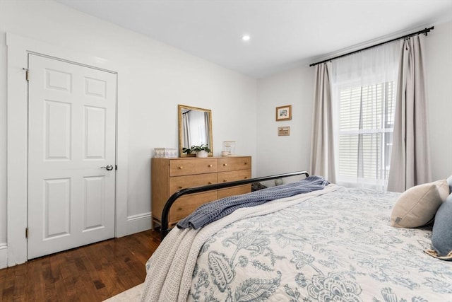 bedroom featuring dark wood-type flooring