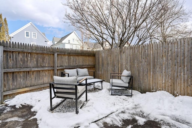 view of snow covered patio