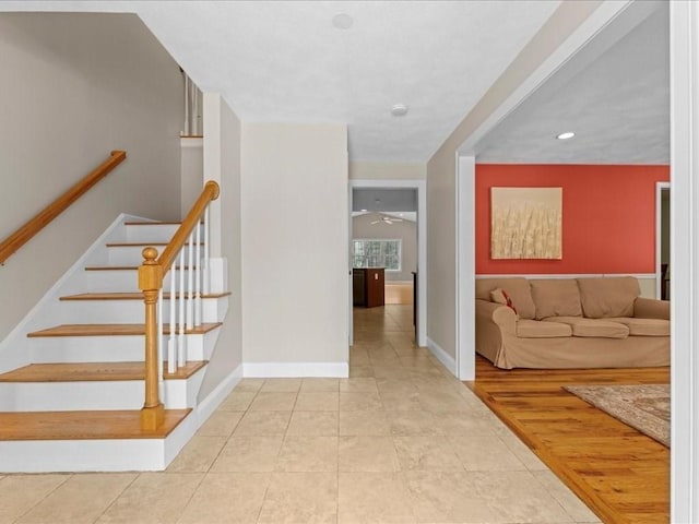 interior space with baseboards and tile patterned floors