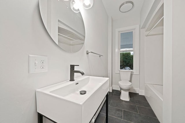 bathroom with tile patterned floors, vanity, and toilet