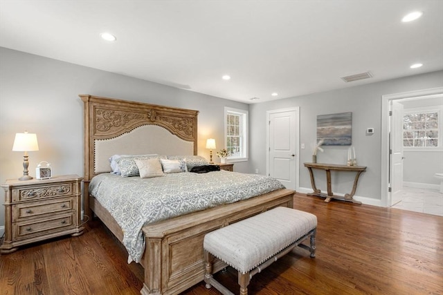 bedroom featuring visible vents, wood finished floors, and recessed lighting