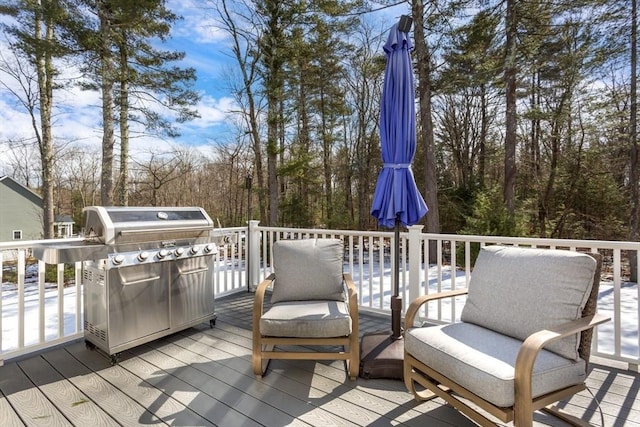 wooden deck with area for grilling