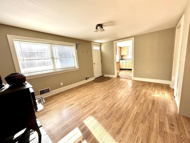 interior space with light hardwood / wood-style floors