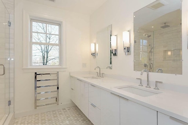 173 S St, Brookline, MA 02467 - full bath with a shower stall and double vanity