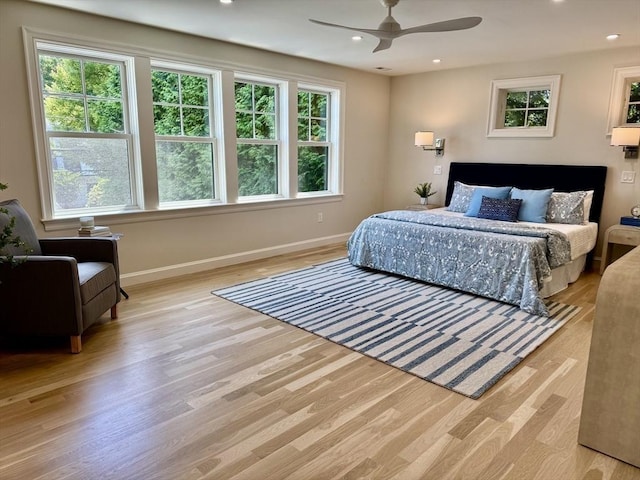173 S St, Brookline, MA 02467 - bedroom featuring light wood-type flooring, multiple windows, recessed lighting, and ceiling fan