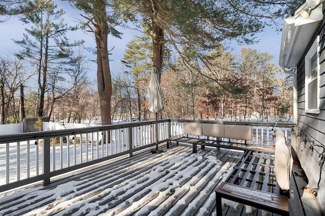 view of snow covered deck