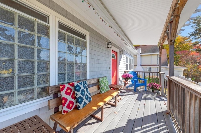 deck with covered porch