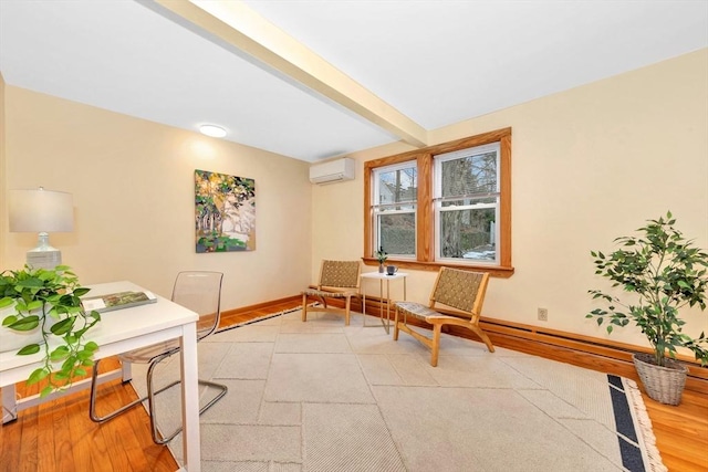 home office with beam ceiling and a wall unit AC