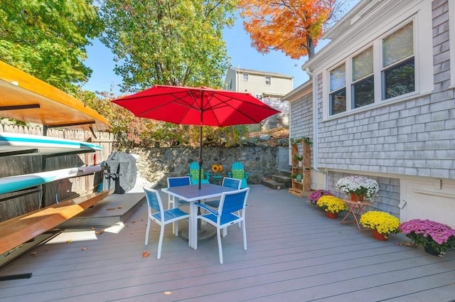 wooden deck featuring grilling area