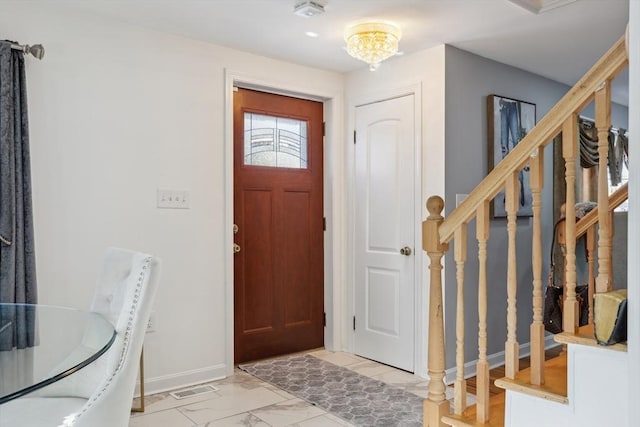 105 Cross St, Randolph, MA 02368 - foyer with a chandelier