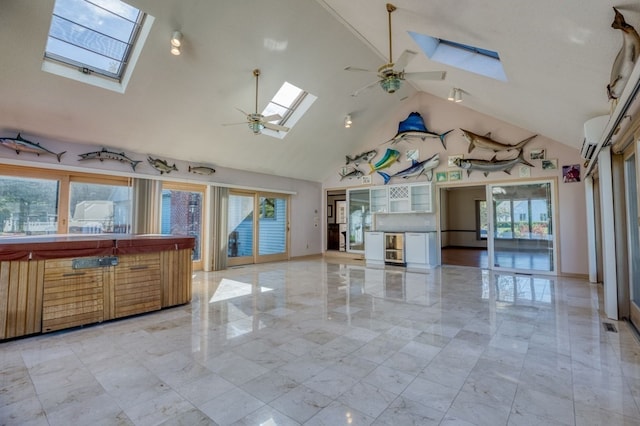 kitchen featuring a skylight and a healthy amount of sunlight