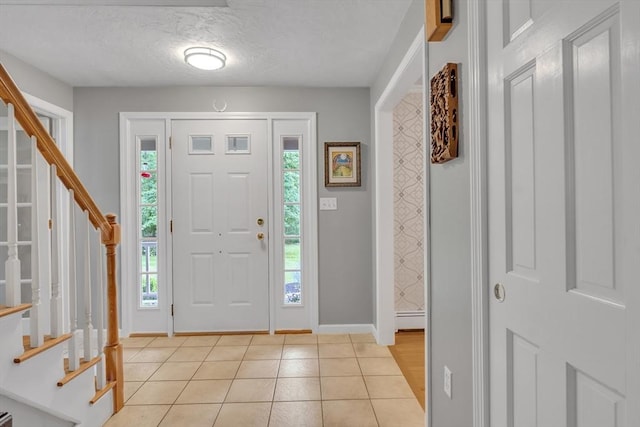 121 Merriam Rd, Grafton, MA 01519 - entrance foyer featuring stairway and light tile patterned floors