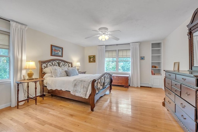 121 Merriam Rd, Grafton, MA 01519 - bedroom with light wood-style flooring, ceiling fan, and baseboard heating