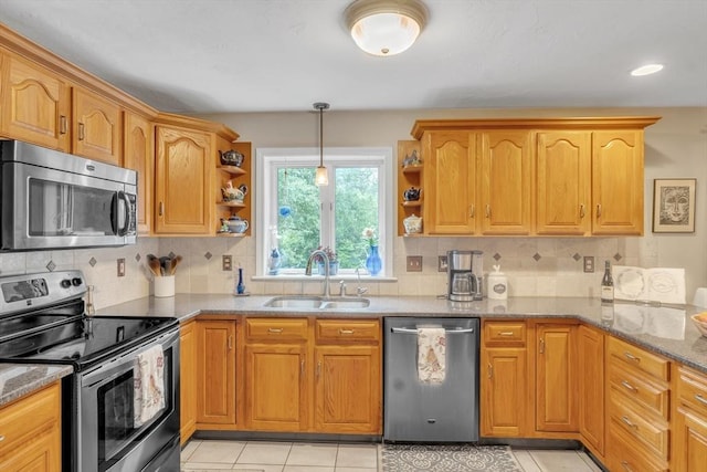 121 Merriam Rd, Grafton, MA 01519 - kitchen featuring appliances with stainless steel finishes, open shelves, stone countertops, and tasteful backsplash
