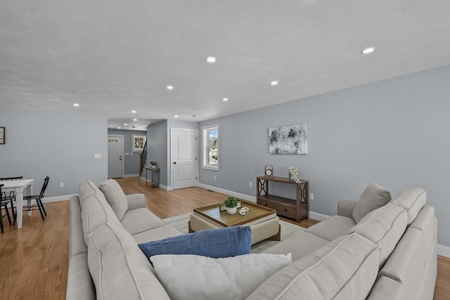 living room with light hardwood / wood-style floors