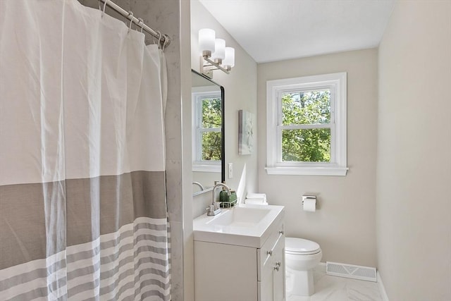 bathroom with baseboards, toilet, marble finish flooring, vanity, and a shower with curtain