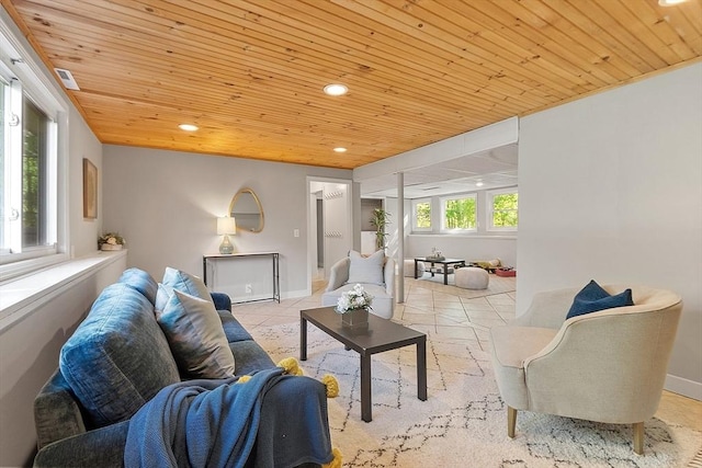 tiled living room featuring wooden ceiling, recessed lighting, and baseboards