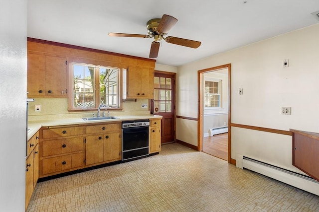 29 Gregory Rd, Wakefield, MA 01880 - kitchen featuring black dishwasher, a baseboard heating unit, light countertops, and a ceiling fan