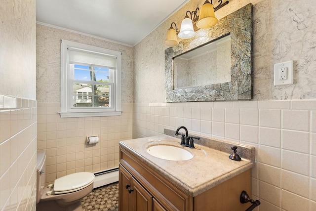 29 Gregory Rd, Wakefield, MA 01880 - bathroom with tile walls, vanity, a baseboard heating unit, and a wainscoted wall