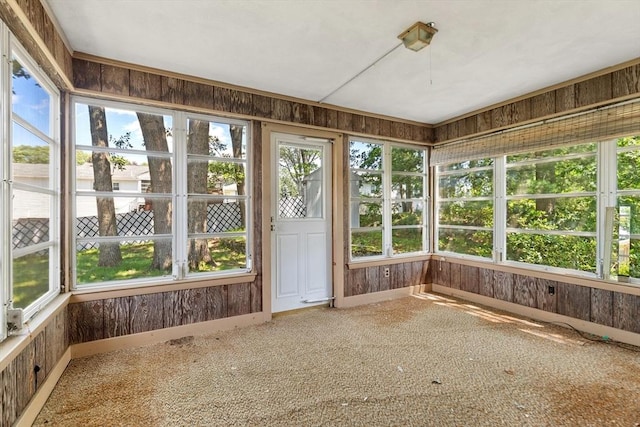 29 Gregory Rd, Wakefield, MA 01880 - unfurnished sunroom with carpet floors and wooden walls