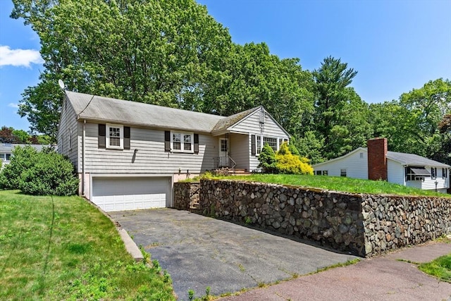 29 Gregory Rd, Wakefield, MA 01880 - single story home featuring driveway, a garage, and a front yard