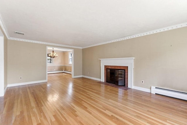 29 Gregory Rd, Wakefield, MA 01880 - unfurnished living room featuring a chandelier, light wood-style floors, crown molding, baseboard heating, and a brick fireplace