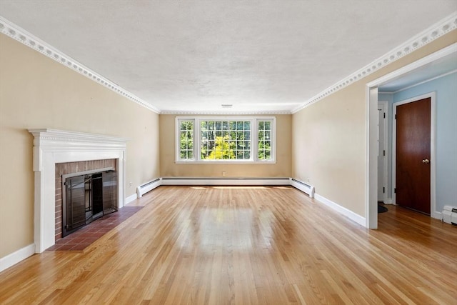 29 Gregory Rd, Wakefield, MA 01880 - unfurnished living room featuring a baseboard heating unit, light wood-style floors, a fireplace, and ornamental molding