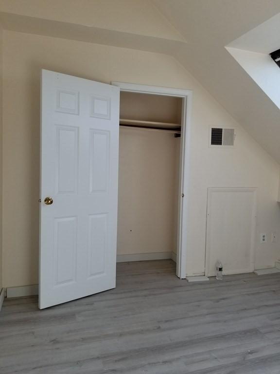 closet featuring visible vents