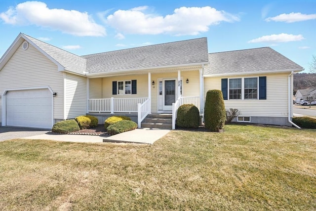 view of front of home with a porch, a garage, a front yard, and roof with shingles