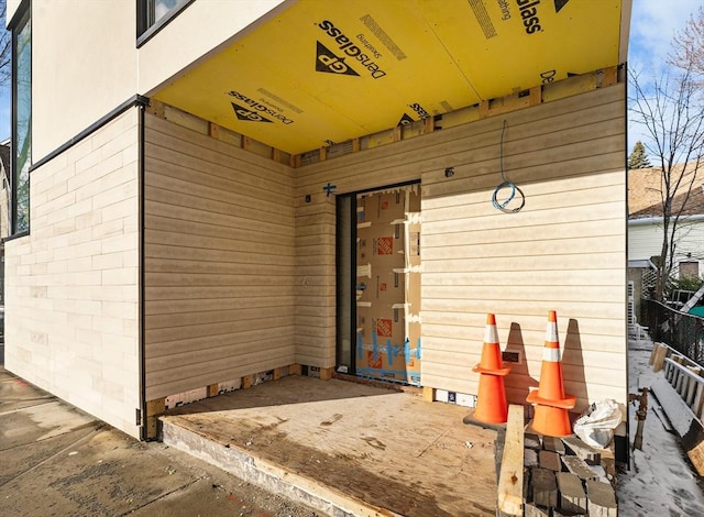 view of exterior entry with crawl space