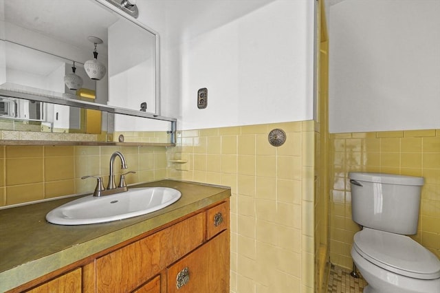 466 Hosmer St, Marlborough, MA 01752 - bathroom featuring tile walls, vanity, and wainscoting