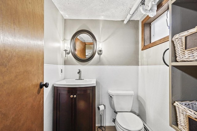 466 Hosmer St, Marlborough, MA 01752 - half bathroom with vanity and a textured ceiling