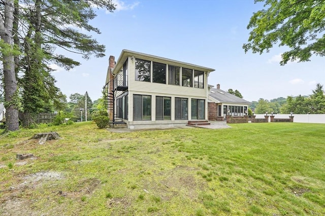 466 Hosmer St, Marlborough, MA 01752 - back of property with a chimney and a sunroom