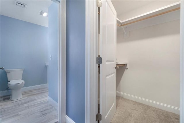 walk in closet featuring visible vents