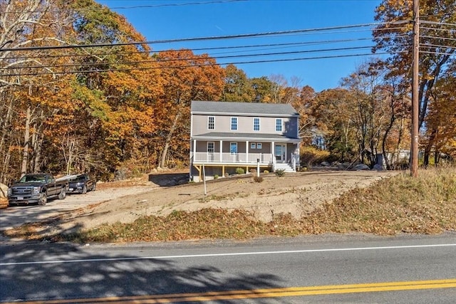 view of front of property featuring covered porch