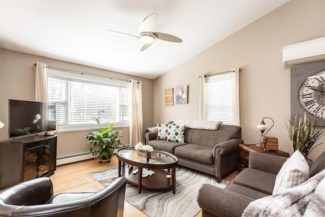 living room featuring a ceiling fan, light wood-type flooring, a wall unit AC, a baseboard radiator, and vaulted ceiling