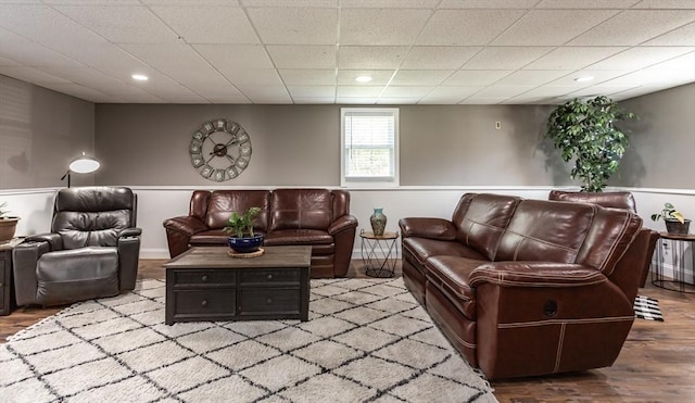 living room with recessed lighting and wood finished floors