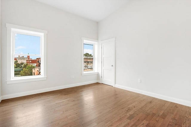 28 Main St Unit 4, Medford, MA 02155 - unfurnished room featuring wood finished floors and baseboards