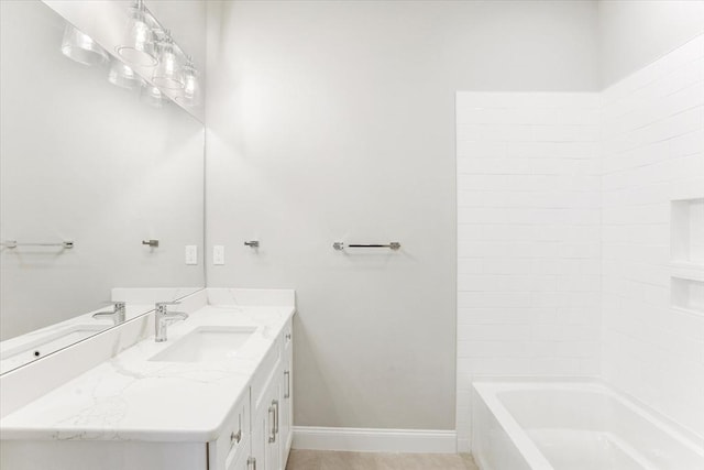 28 Main St Unit 4, Medford, MA 02155 - full bath with vanity, baseboards, and bathing tub / shower combination
