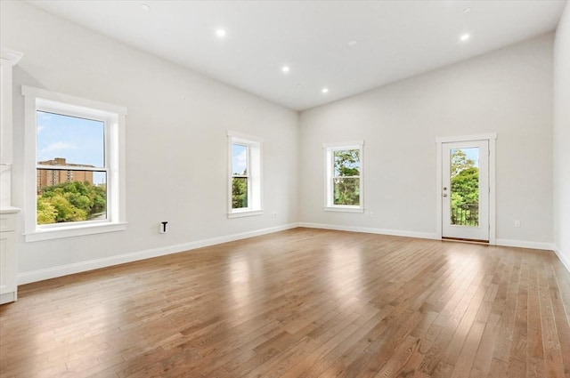 28 Main St Unit 4, Medford, MA 02155 - unfurnished room with healthy amount of natural light, light wood-style flooring, baseboards, and recessed lighting