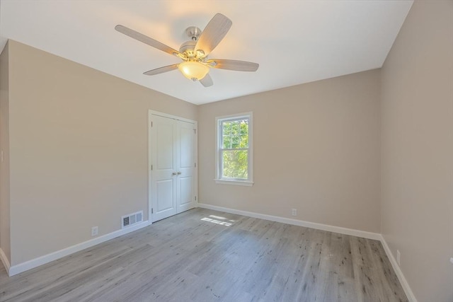 136 E St, South Hadley, MA 01075 - spare room with light wood-style flooring and a ceiling fan