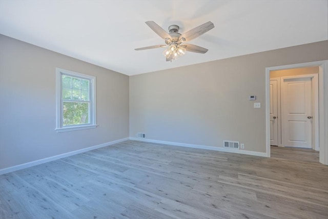 136 E St, South Hadley, MA 01075 - empty room with light wood-style floors and ceiling fan