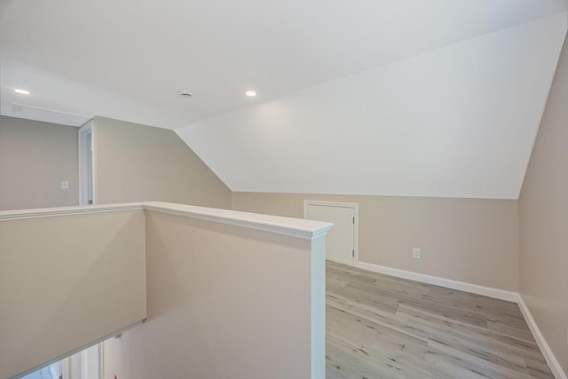 136 E St, South Hadley, MA 01075 - additional living space with light wood-style flooring, recessed lighting, and lofted ceiling