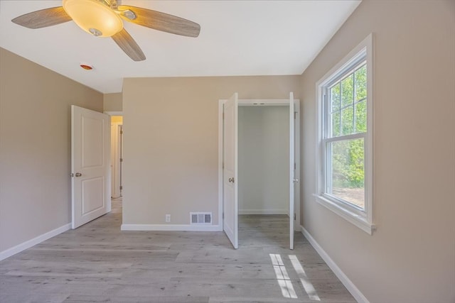 136 E St, South Hadley, MA 01075 - unfurnished bedroom with light wood-type flooring and ceiling fan