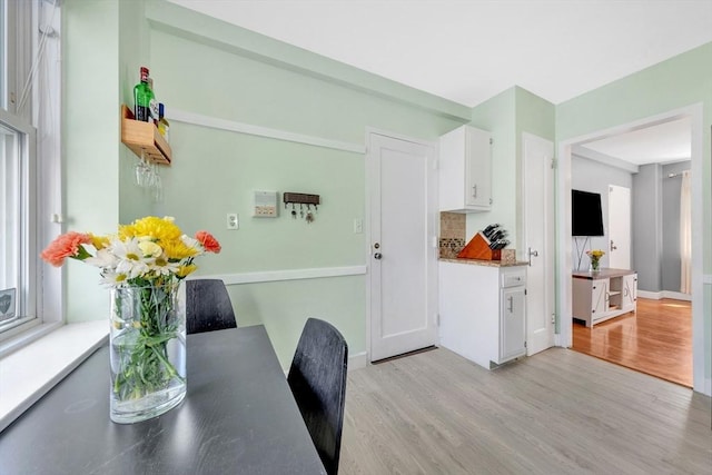 9 Twomey Ct Unit 52, Boston, MA 02127 - dining room with light wood-type flooring