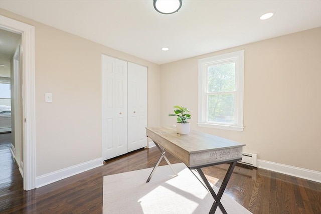 office space with dark wood-type flooring, baseboards, a baseboard heating unit, and recessed lighting