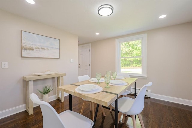 dining area with baseboards, wood finished floors, a baseboard heating unit, and recessed lighting