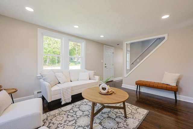 living area featuring baseboards, dark wood-style flooring, recessed lighting, stairs, and baseboard heating